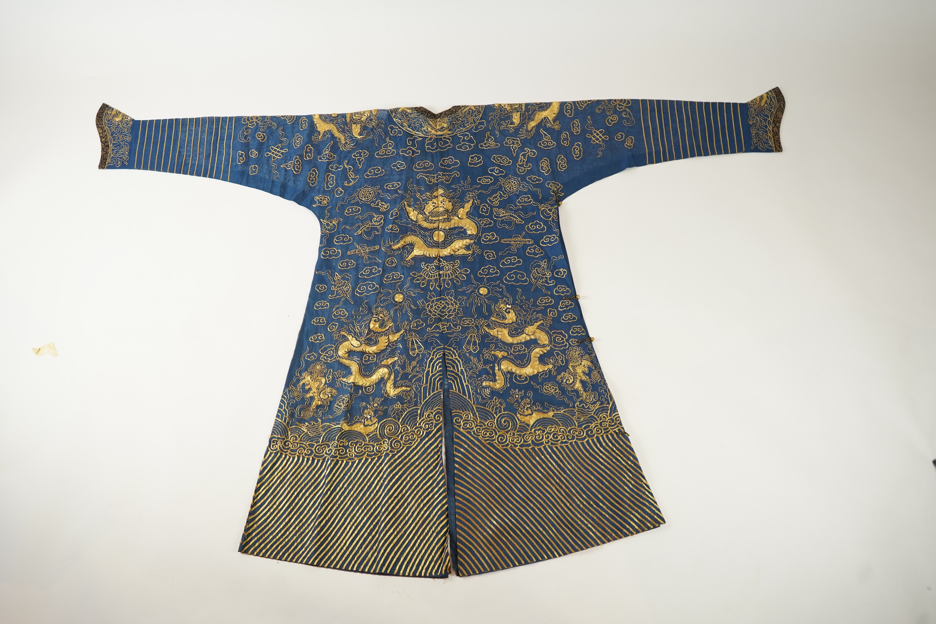 A Chinese gold thread and silk gauze ‘dragon’ summer robe, jifu, early 20th century